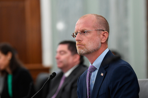 FILE - Brendan Carr listens during a Senate Commerce, Science, and Transportation committee hearing to examine the Federal Communications Commission on Capitol Hill in Washington, June 24, 2020. (Jonathan Newton/The Washington Post via AP, File)