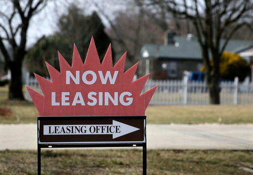 FILE - This March 16, 2015 photo shows a "now leasing" sign outside an apartment complex near Millville, N.J. (AP Photo/Mel Evans, file)