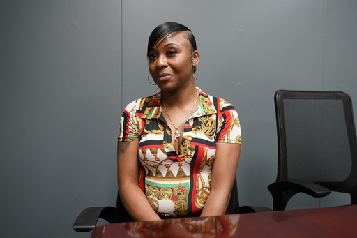 FILE - Porcha Woodruff poses for a portrait on Aug. 7, 2023, in Oak Park, Mich. (AP Photo/Carlos Osorio, File)
