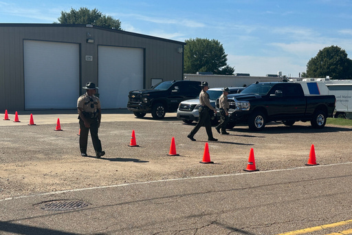 Tennessee Highway Patrol troopers are seen at a staging center for law enforcement on Tuesday, Sept. 30, 2025, in Memphis, Tenn. (AP Photo/Adrian Sainz)