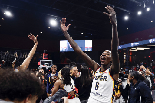 Indiana Fever forward Natasha Howard (6) reacts after her team defeated the Atlanta Dream in Game 3 in the first round of the WNBA basketball playoffs, Thursday, Sept. 18, 2025, in Atlanta. (AP Photo/Butch Dill)