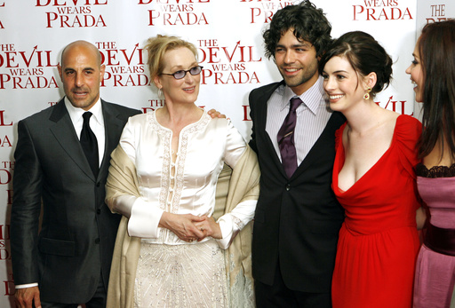 FILE - Cast members from left to right, Stanley Tucci, Meryl Streep, Adrian Grenier, Anne Hathaway, and Emily Blunt, pose for photographers during the red carpet arrivals for the New York premiere of the film titled "The Devil Wears Prada," Monday, June 19, 2006. (AP Photo/Stuart Ramson, File)