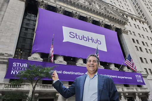 StubHub CEO Eric Baker poses for photos outside the New York Stock Exchange before his company's IPO, Wednesday, Sept. 17, 2025. (AP Photo/Richard Drew)