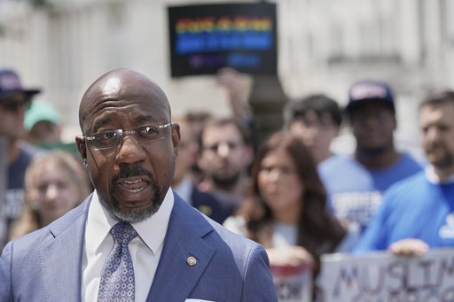 FILE - Sen. Raphael Warnock, D-Ga., speaks during a news conference on the Voting Rights Advancement Act, on Capitol Hill Tuesday, July 29, 2025, in Washington. (AP Photo/Mariam Zuhaib, File)