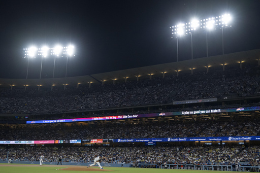 Los Angeles Dodgers starting pitcher Clayton Kershaw (22) delivers during the first inning of a baseball game against the San Francisco Giants in Los Angeles, Friday, Sept. 19, 2025. (AP Photo/Kyusung Gong)