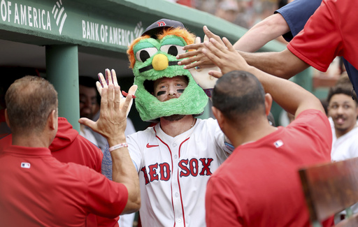 Boston Red Sox's Trevor Story celebrates after his home run during the sixth inning of a baseball game against the Cleveland Guardians, Monday, Sept. 1, 2025, in Boston. (AP Photo/Mark Stockwell)