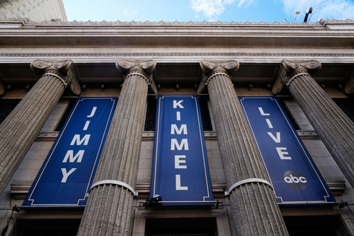 Banners are placed outside the El Capitan Entertainment Centre, where Jimmy Kimmel Live! is filmed, on Thursday, Sept. 18, 2025, in Los Angeles. (AP Photo/Damian Dovarganes)