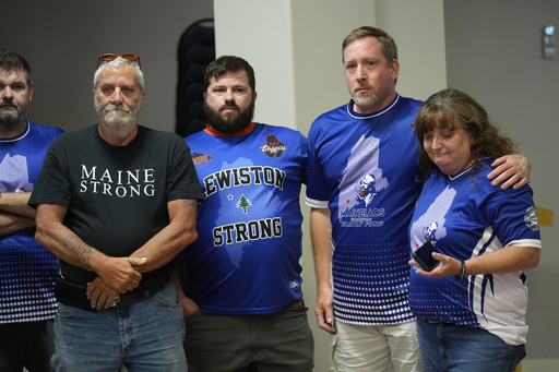 Victims and relatives of the October 2023 mass shooting attend a news conference, Wednesday, Sept. 3, 2025, in Lewiston, Maine. (AP Photo/Robert F. Bukaty)