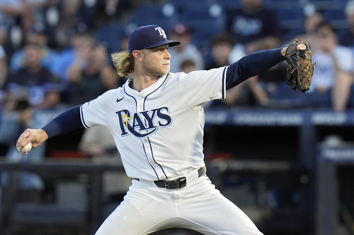 Tampa Bay Rays pitcher Shane Baz delivers to the Seattle Mariners during the first inning of a baseball game Monday, Sept. 1, 2025, in Tampa, Fla. (AP Photo/Chris O'Meara)