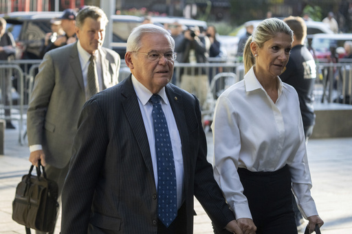 FILE - Democratic U.S. Sen. Bob Menendez of New Jersey, left, and his wife, Nadine Menendez, arrive at the federal courthouse in New York, Sept. 27, 2023. (AP Photo/Jeenah Moon, File)