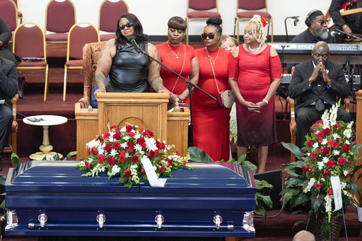 FILE - DeAsia Harmon speaks at the funeral for her husband D'Vontaye Mitchell, July 11, 2024, in Milwaukee. Mitchell died June 30 after an incident at a hotel. (AP Photo/Morry Gash, file)