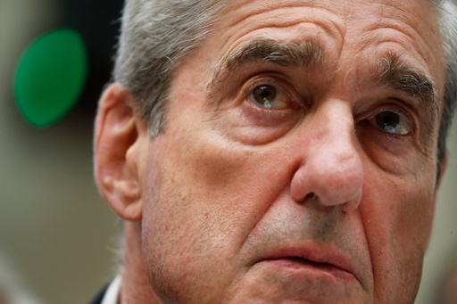 FILE - Former special counsel Robert Mueller testifies before the House Intelligence Committee hearing on his report on Russian election interference, on Capitol Hill, July 24, 2019 in Washington. (AP Photo/Alex Brandon, File)