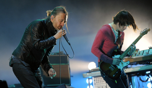 FILE - In this April 14, 2012 file photo, Thom Yorke, left, and Jonny Greenwood of Radiohead perform during the band's headlining set at the 2012 Coachella Valley Music and Arts Festival in Indio, Calif. (AP Photo/Chris Pizzello, File)