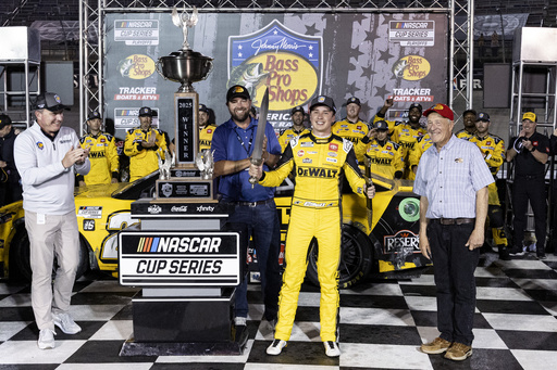 Christopher Bell celebrates winning a NASCAR Cup Series auto race, Saturday, Sept. 13, 2025, in Bristol, Tenn. (AP Photo/Wade Payne)
