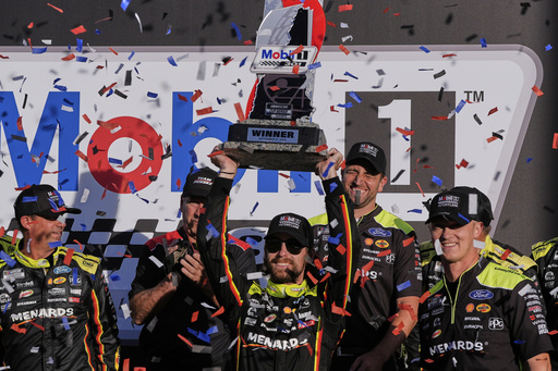 Ryan Blaney celebrates after winning a NASCAR Cup Series race at New Hampshire Motor Speedway, Sunday, Sept. 21, 2025, in Loudon, N.H. (AP Photo/Charles Krupa)