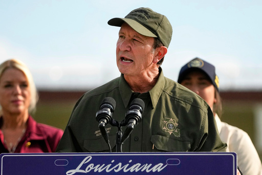 FILE - Louisiana Gov. Jeff Landry speaks to reporters outside "Camp 57," a facility to house immigration detainees at the Louisiana State Penitentiary in Angola, La., Wednesday, Sept. 3, 2025. (AP Photo/Gerald Herbert, File)