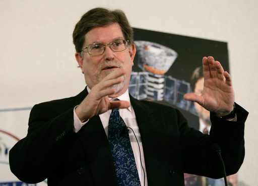 FILE - Dr. George Smoot, professor of Physics at the University of California Berkeley, gestures during a media conference Tuesday, Oct. 3, 2006, in Berkeley, Calif. (AP Photo/Ben Margot, File)