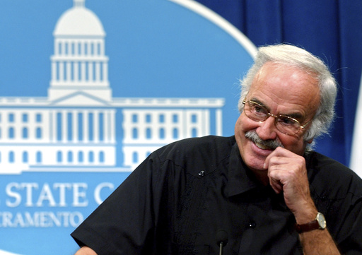 FILE - State Sen. President Pro Tem John Burton, D-San Francisco, smiles as he reminisces about his time in the Legislature during a Capitol news conference held in Sacramento, Calif., Tuesday, Aug. 31, 2004. (AP Photo/Rich Pedroncelli)