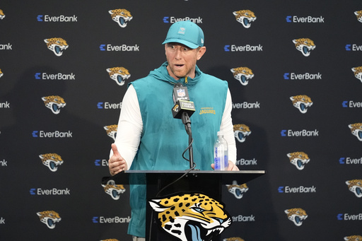Jacksonville Jaguars head coach Liam Coen speaks at a news conference after an NFL football game against the Carolina Panthers, Sunday, Sept. 7, 2025, in Jacksonville, Fla. (AP Photo/John Raoux)