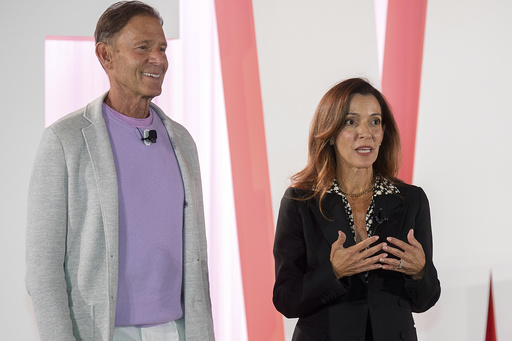 FILE - Joe Deitch, chairman of the Elevate Prize Foundation, left, and Carolina Garcia Jayaram, CEO of the Elevate Prize Foundation, speak in Miami Beach, Fla., on Wednesday, May 14, 2025. (AP Photo/Michael Laughlin, File)