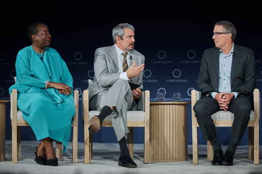 Mark Viso from Food For the Hungry, center, speaks as Angela Williams from United Way Worldwide, left, and Michael Nyenhuis from UNICEF USA, right, listen during the Concordia Annual Summit in New York, Wednesday, Sept. 24, 2025. (AP Photo/Andres Kudacki)