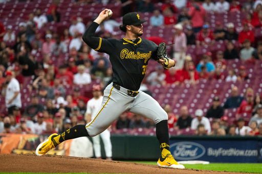Pittsburgh Pirates pitcher Paul Skenes delivers in the first inning of a baseball game against the Cincinnati Reds, Wednesday, Sept. 24, 2025, in Cincinnati. (AP Photo/Michael Swensen)