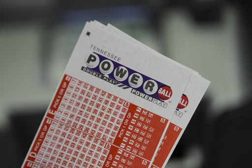 Powerball play slips are seen Friday, Aug. 29, 2025, in Nashville, Tenn. (AP Photo/George Walker IV)
