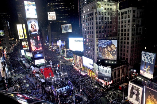 FILE - In this Dec. 31, 2011 file photo, the crowd packs New York's Times Square during the New Year's Eve celebration as seen from the Marriott Marquis hotel. (AP Photo/Mary Altaffer, File)