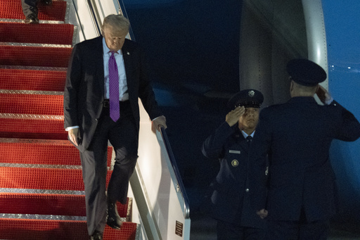 President Donald Trump arrives at Joint Base Andrews, Md., on Air Force One, Sunday, Sept. 14, 2025. (AP Photo/Manuel Balce Ceneta)