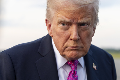 President Donald Trump speaks with reporters before he departs on Air Force One at Morristown Airport, Sunday, Sept. 14, 2025, in Morristown, N.J. (AP Photo/Alex Brandon)