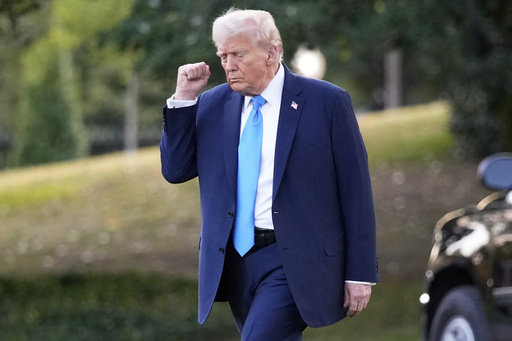 President Donald Trump walks across the South Lawn of the White House to board Marine One en route to Joint Base Andrews, Md., Monday, Sept. 22, 2025, in Washington. (AP Photo/Mark Schiefelbein)
