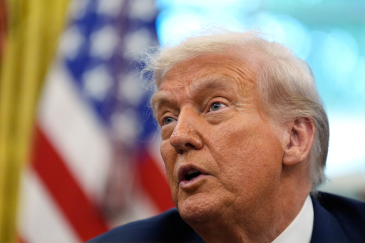 President Donald Trump speaks to reporters after signing an executive order regarding TikTok in the Oval Office at the White House, Thursday, Sept. 25, 2025, in Washington. (AP Photo/Alex Brandon)