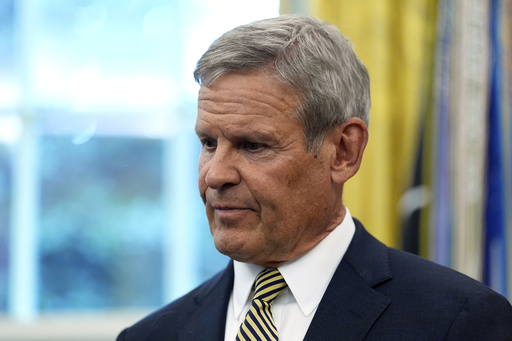 Tennessee Gov. Bill Lee listens as President Donald Trump speaks in the Oval Office of the White House, Monday, Sept. 15, 2025, in Washington. (AP Photo/Alex Brandon)
