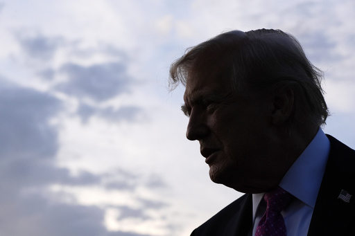 FILE - President Donald Trump speaks with reporters before boarding Air Force One at Morristown Airport, Sept. 14, 2025, in Morristown, N.J. (AP Photo/Alex Brandon, File)