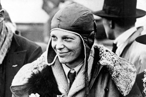 FILE - Amelia Earhart poses for photos as she arrives in Southampton, England, after her transatlantic flight on the "Friendship" from Burry Point, Wales, June 26, 1928. (AP Photo/File)