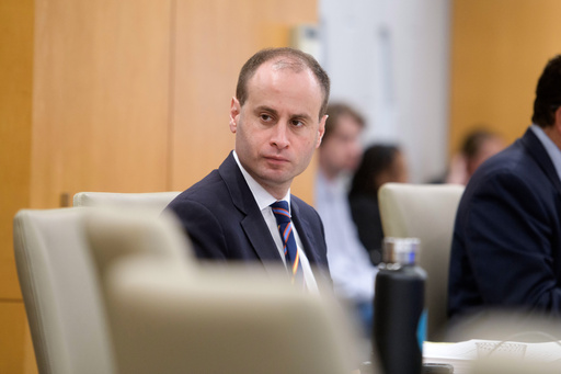 National Capital Planning Commission Chairman Will Scharf presides over a National Capital Planning Commission meeting, Thursday, Sept. 4, 2025, in Washington. (AP Photo/Rod Lamkey, Jr.)