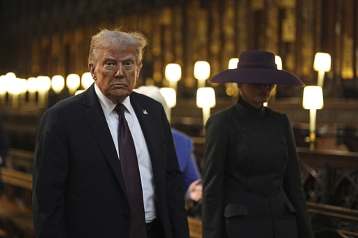 President Donald Trump and first lady Melania Trump attend their visit to St George's Chapel at Windsor Castle, in Windsor, England, Wednesday Sept. 17, 2025. (Aaron Chown/Pool Photo via AP)