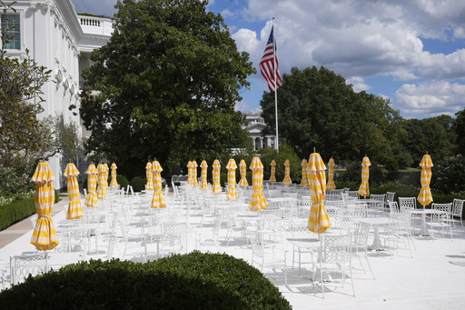 The Rose Garden of The White House is seen from the Colonnade Tuesday, Sept. 2, 2025, in Washington. (AP Photo/Mark Schiefelbein)