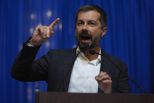 Former Transportation Secretary Pete Buttigieg speaks at a rally at the Statehouse in Indianapolis, Thursday, Sept. 18, 2025 for Indiana Democrats amid pressure from President Donald Trump on Republicans who control the state's legislature to redistrict congressional seats. (AP Photo/Michael Conroy)