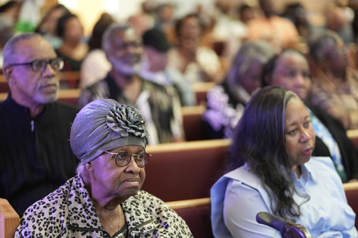 People attend a service at St. James Church, where Democrat Rep. Emanuel Cleaver II was once pastor and is now facing an uphill reelection battle after the Missouri legislature redrew maps to to divide Clever's congressional district among three districts, Sunday, Sept. 7, 2025, in Kansas City, Mo. (AP Photo/Charlie Riedel)