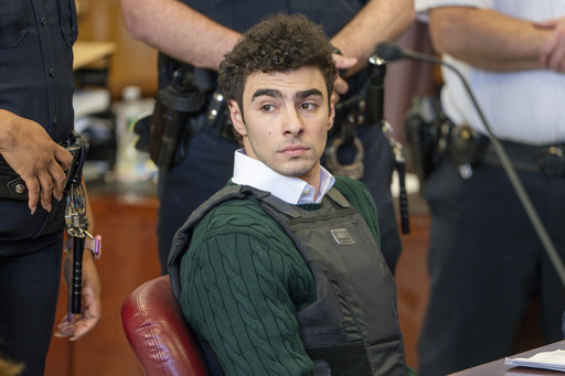 FILE - Luigi Mangione, accused of fatally shooting the UnitedHealthcare CEO Brian Thompson in New York City and leading authorities on a five-day search, appears in court for a hearing, Feb. 21, 2025, in New York. (Steven Hirsch/New York Post via AP, Pool, File)
