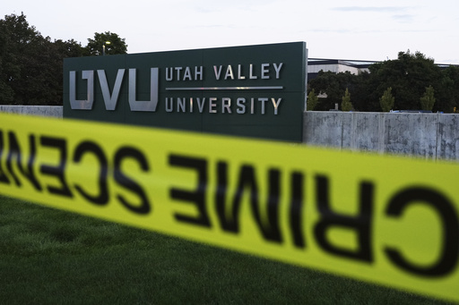 FILE - Crime scene tape surrounds Utah Valley University after Turning Point USA CEO and co-founder Charlie Kirk was shot and killed Sept. 13, 2025, in Orem, Utah. (AP Photo/Lindsey Wasson, File)