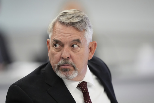 Committee member, Dr. Joseph Hibbeln, listens during a meeting of the Advisory Committee on Immunization Practices at the CDC on Thursday, Sept. 18, 2025, in Chamblee, Ga. (AP Photo/Brynn Anderson)