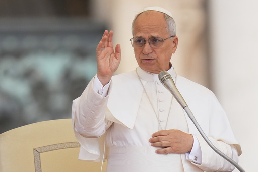 FILE - Pope Leo XIV delivers a blessing during the weekly general audience in St. Peter's Square, at the Vatican, Wednesday, Sept. 24 2025. (AP Photo/Alessandra Tarantino, File)