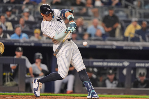 New York Yankees' Aaron Judge hits a three-run home run during the second inning of a baseball game against the Chicago White Sox Wednesday, Sept. 24, 2025, in New York. (AP Photo/Frank Franklin II)
