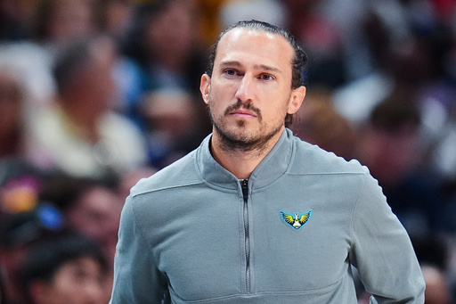 FILE - Dallas Wings head coach Chris Koclanes looks on during the first half of a WNBA basketball game against the Indiana Fever, Friday, Aug. 1, 2025, in Dallas. (AP Photo/Julio Cortez, FIle)