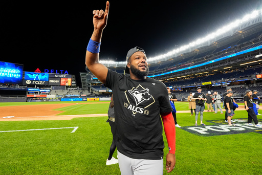 Toronto Blue Jays first baseman Vladimir Guerrero Jr. celebrates after the Blue Jays beat the New York Yankees in Game 4 of baseball's American League Division Series, Wednesday, Oct. 8, 2025, in New York. (AP Photo/Yuki Iwamura)