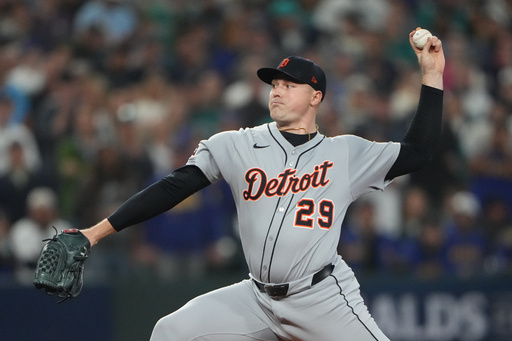 Detroit Tigers pitcher Tarik Skubal throws during the first inning in Game 5 of baseball's American League Division Series against the Seattle Mariners, Friday, Oct. 10, 2025, in Seattle. (AP Photo/Lindsey Wasson)