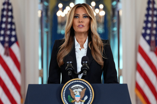 First lady Melania Trump speaks in the Grand Foyer of the White House, Friday, Oct. 10, 2025, in Washington. (AP Photo/Alex Brandon)