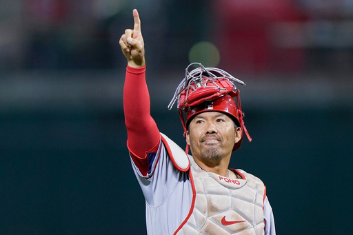 FILE - Los Angeles Angels catcher Kurt Suzuki gestures as he leaves a baseball game against the Oakland Athletics during the first inning in Oakland, Calif., Tuesday, Oct. 4, 2022. (AP Photo/Godofredo A. Vásquez, File)